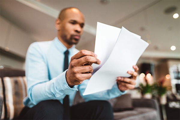 Businessman reviewing paperwork